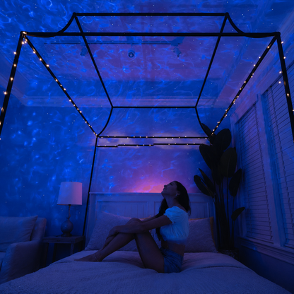 Compact galaxy star projector on a modern desk