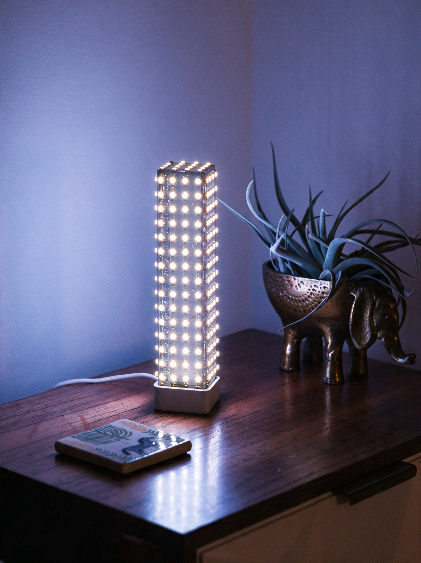 Lumen smart LED lamp with shade removed showing raw LED core